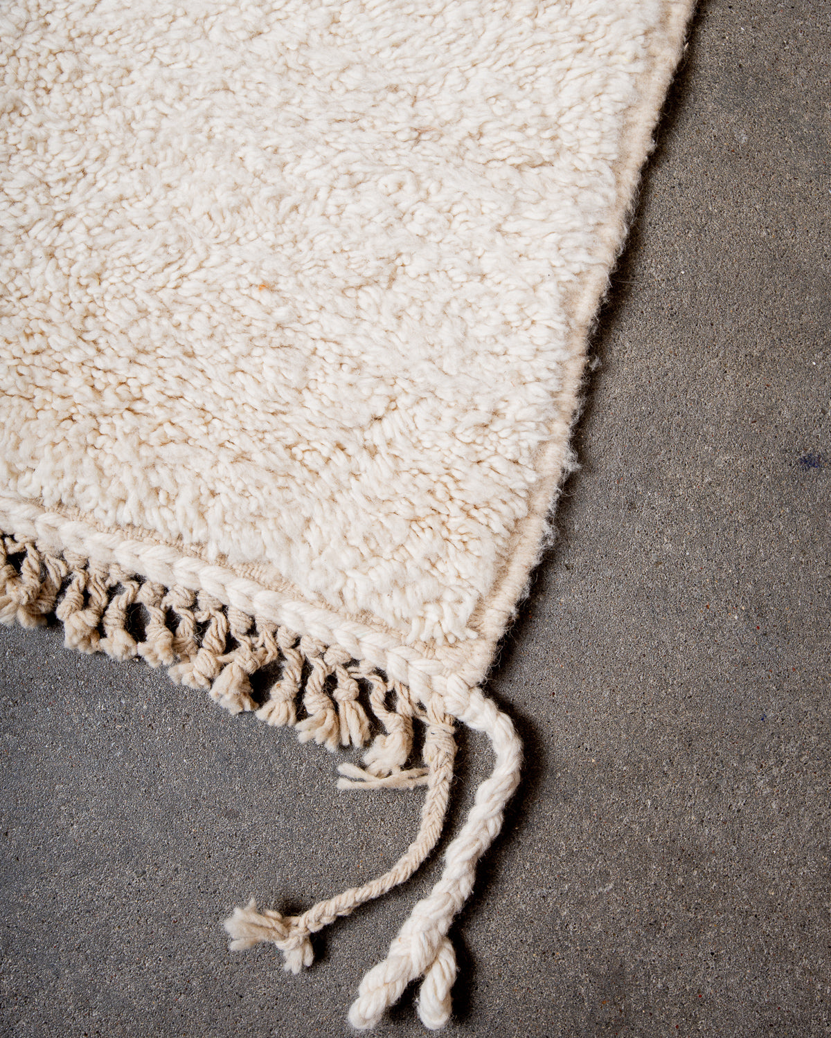 Modern, designer, handcrafted Berber rug from Morocco. Beniourain carpet with beautiful colours and patterns and fluffy wool texture.